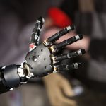 Close-up of a robotic hand with intricate mechanical parts
